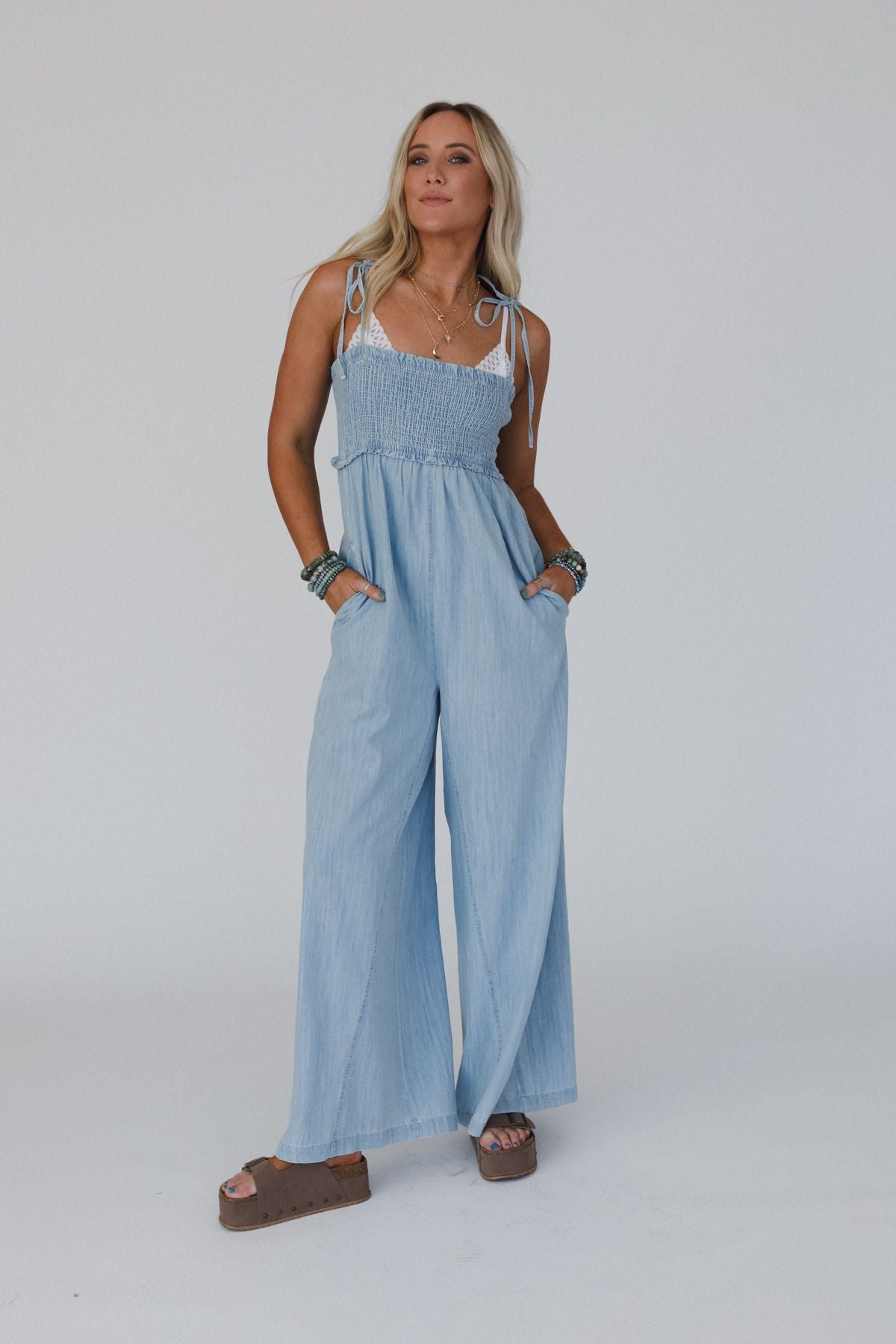 The Nest Last Call Smocked Jumpsuit - Light Wash - Pre Order
